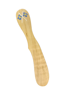 The Hand Painted Swedish Wood Butter Spreader features Dala horse and Swedish flag designs, making it a charming way to serve butter with traditional flair.