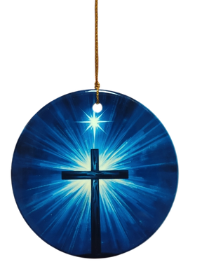 The Ornament: Blue Cross and Star Ceramic Ornament features a glowing blue cross with radiant light, hanging by a gold string on a white background—a striking spiritual accent for any space.