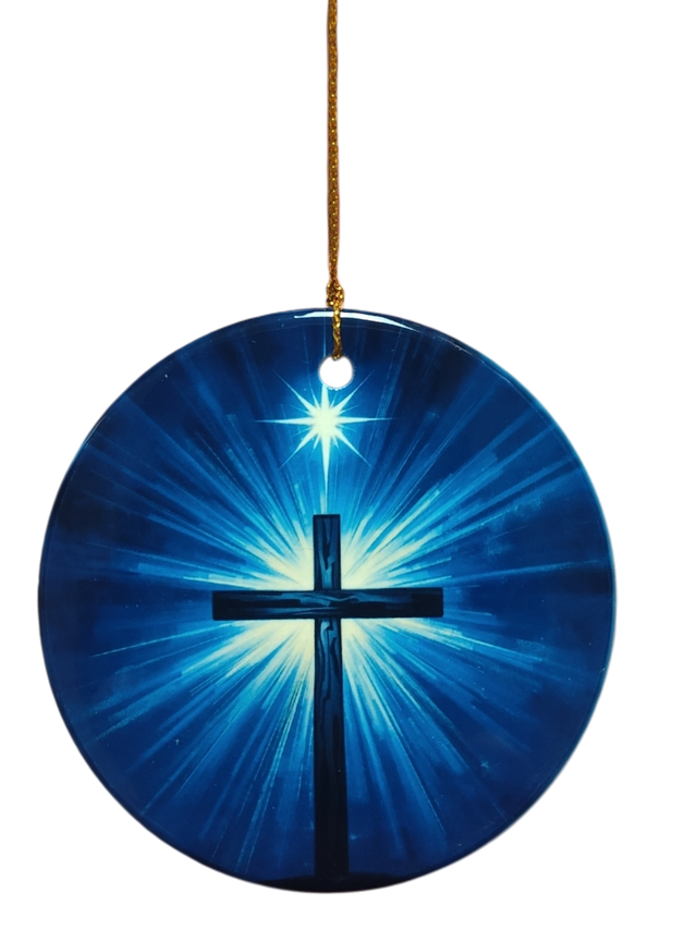 The Ornament: Blue Cross and Star Ceramic Ornament features a glowing blue cross with radiant light, hanging by a gold string on a white background—a striking spiritual accent for any space.