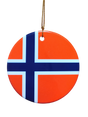 The Ornament: Iceland Flag Ceramic Ornament is a round ceramic ornament displaying the Icelandic flag, with a blue cross outlined in white on a red background, hanging from a gold string—perfect for celebrating Icelandic heritage.