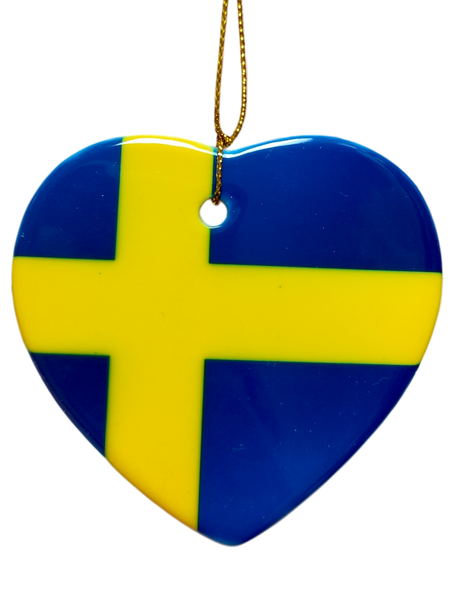 Ornament: Sweden Flag Ceramic Heart Shaped Ornament—features a yellow cross on blue and comes with a gold hanging string, adding a perfect touch of Swedish heritage.