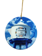 The Ornament: Valkommen till Lindstrom Ceramic Ornament features a water tower painted as a teapot with “Välkommen till Lindström” in Swedish, celebrating the city's Scandinavian heritage against a blue sky.