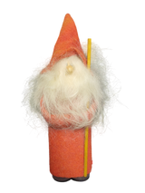 A small gnome figurine called "Figurine: Gnome with Tall Red Hat," featuring a long white beard and red hat, is perfect for adding unique holiday décor to your home.