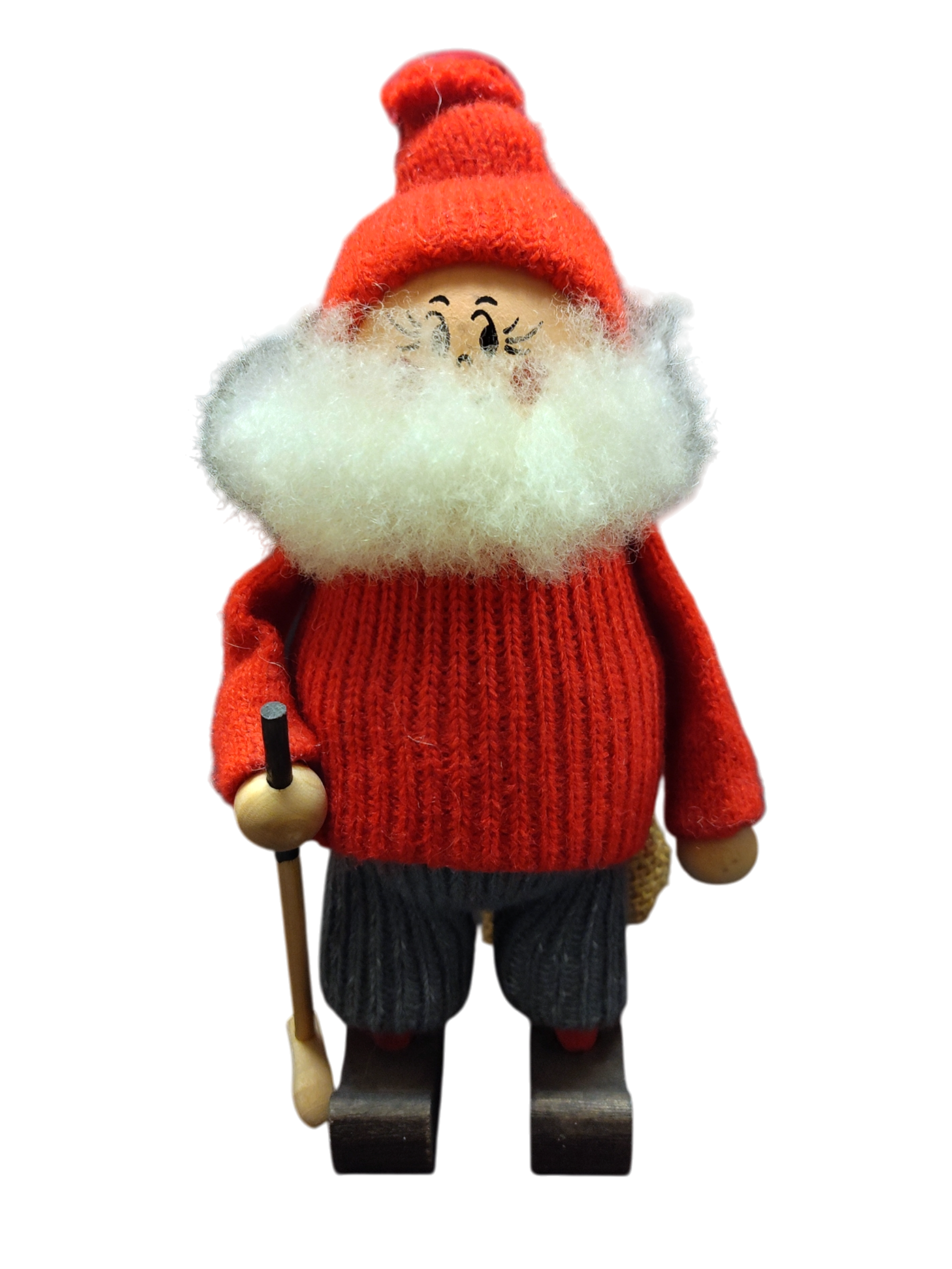 Handmade Christmas decor: Wooden figurine of Santa with a white beard, red knit hat and sweater, holding wooden golf clubs.