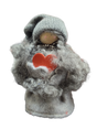 The Figurine: Santa Girl with Heart is a small, handmade Swedish decoration featuring a gray knitted hat, fuzzy gray clothes, and a red heart—perfect for adding Scandinavian charm to your décor.