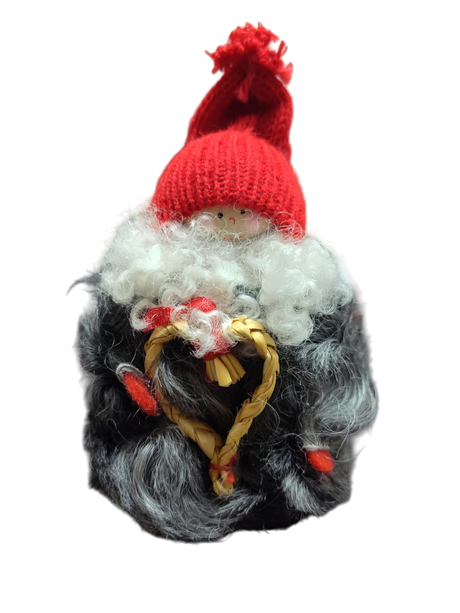 The "Figurine: Tomte with Straw Heart" features a red knit hat, white curly beard, straw heart, and furry gray coat—handcrafted holiday décor inspired by Scandinavian folklore.