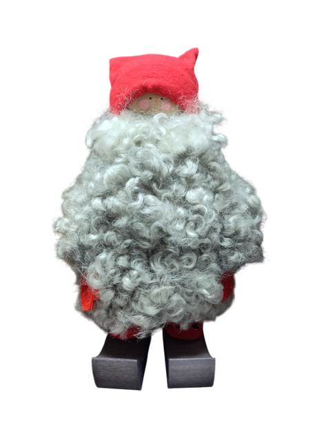 The Santa Figurine 11" features a curly gray beard, red hat and sleeves, and wooden shoes—an ideal holiday decor piece—displayed on a white background.