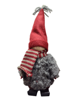 The Santa Boy and Girl Figurine 11" features plush details—a red pointed hat, striped scarf, gray curly body, and black boots—perfect Scandinavian-inspired holiday decor for any space.