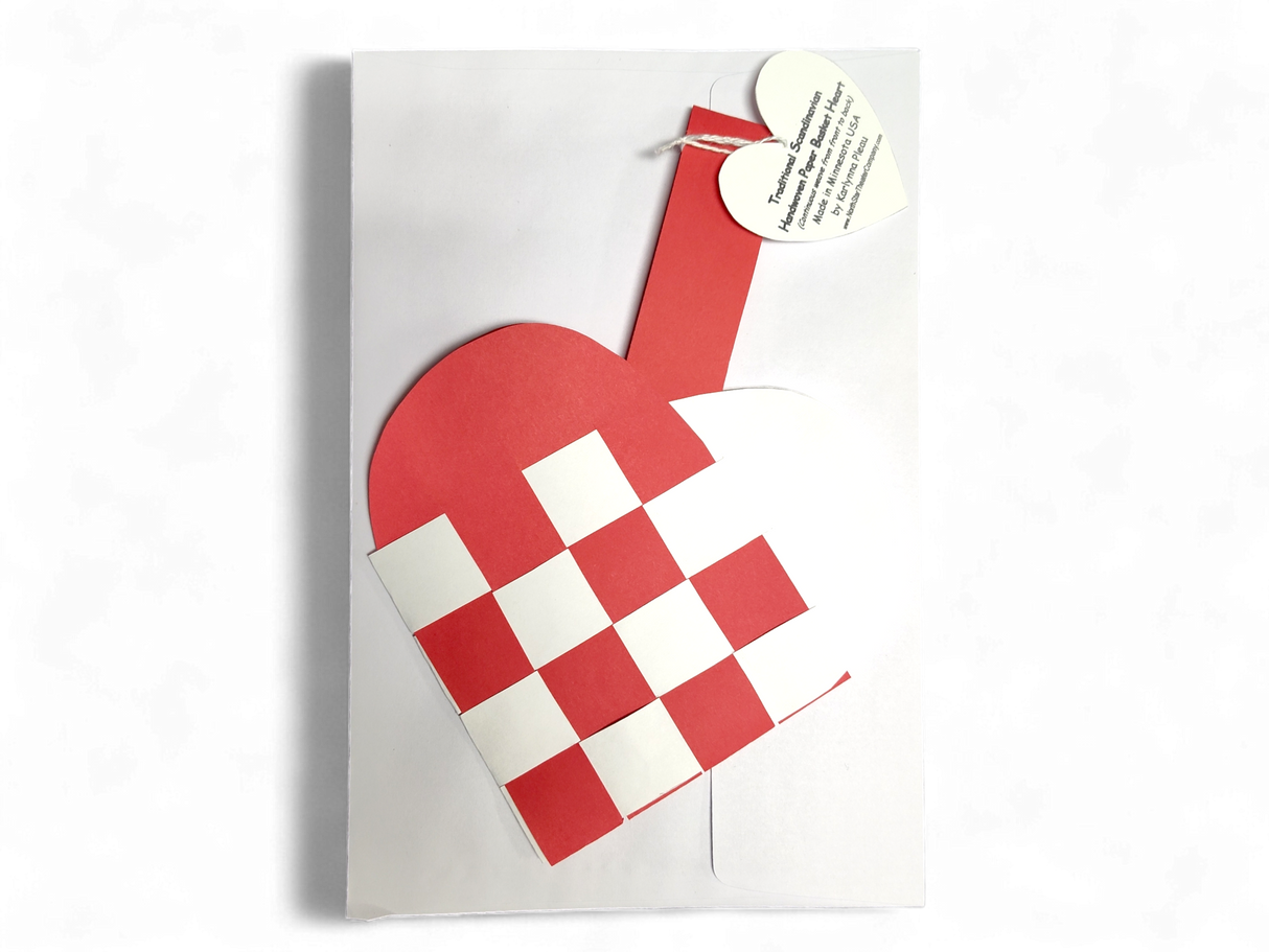 A "Card: Danish Flag Traditional Scandinavian Handwoven Paper Basket Heart" includes a red and white checkered paper heart basket on a white card, adorned with a small heart-shaped tag tied to the handle.