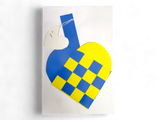 A Card: Swedish Flag Traditional Scandinavian Handwoven Paper Basket Heart with a heart-shaped tag attached by string, shown on a white background.
