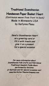 Discover the Card: Swedish Flag Traditional Scandinavian Handwoven Paper Basket Heart, crafted in Minnesota by Karlynna Pleau. Perfect as decor or a gift. Learn more about this charming handwoven basket heart on our website.
