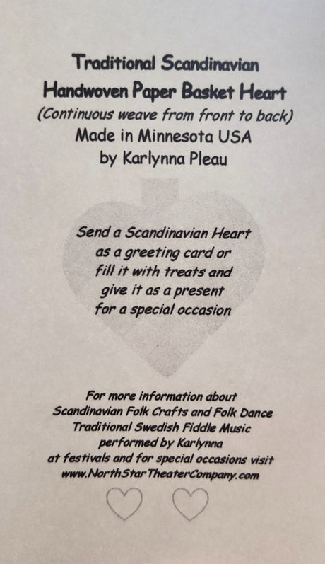 Discover the Card: Swedish Flag Traditional Scandinavian Handwoven Paper Basket Heart, crafted in Minnesota by Karlynna Pleau. Perfect as decor or a gift. Learn more about this charming handwoven basket heart on our website.