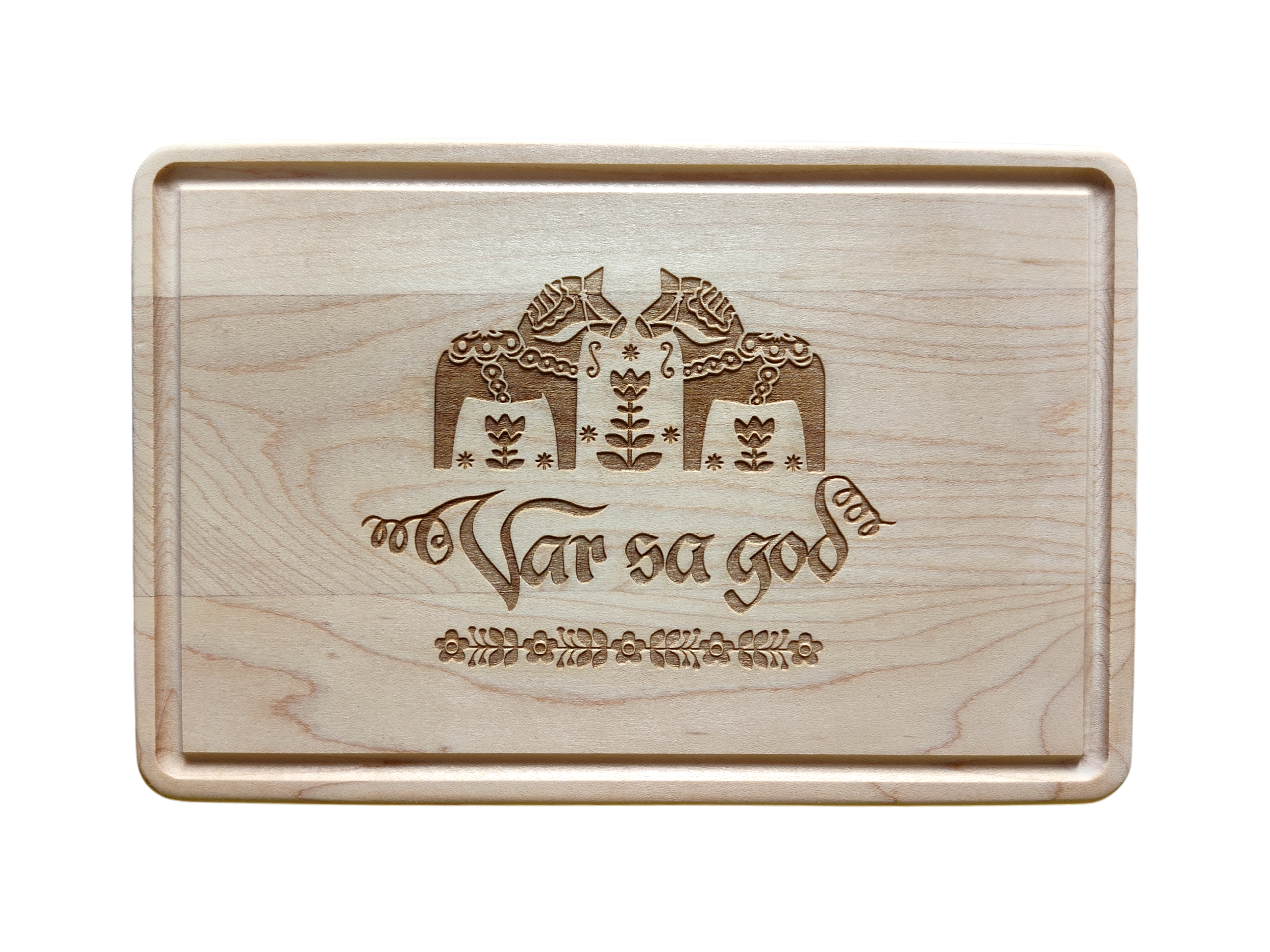 The Cutting Board: Var Sa God Maple Cutting Board (9"x6") features an engraved Scandinavian design and the phrase "Var så god" in script, making it a charming addition to any Scandinavian kitchen decor.