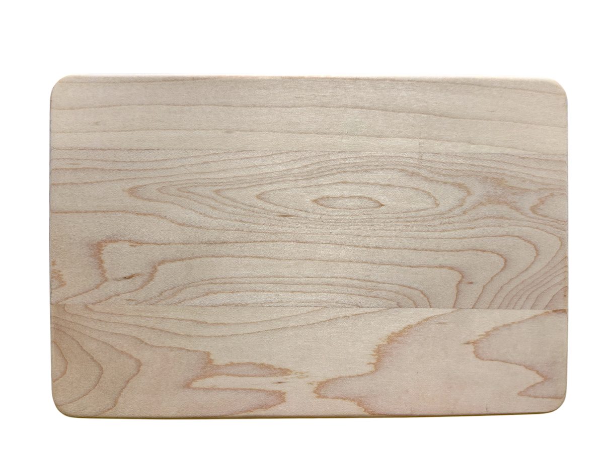 The Var Sa God Maple Cutting Board (9"x6") features a light natural finish and visible wood grain, ideal for enhancing Scandinavian kitchen decor, shown on a white background.