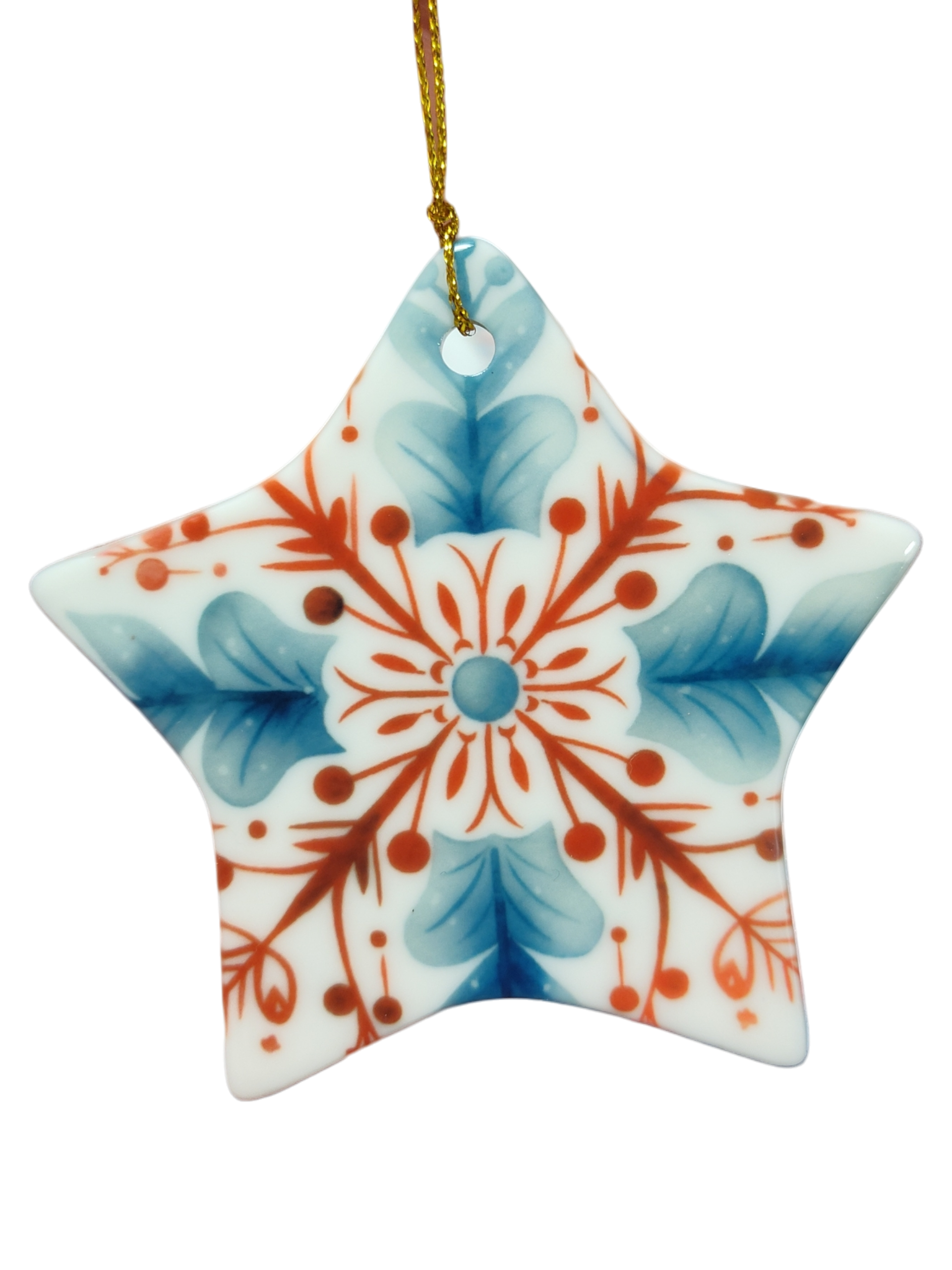 The Ornament: Red, White, and Blue Rosemaling Star Ceramic Ornament features a star shape with blue and red Scandinavian floral patterns, displayed hanging by a gold string against a white background.