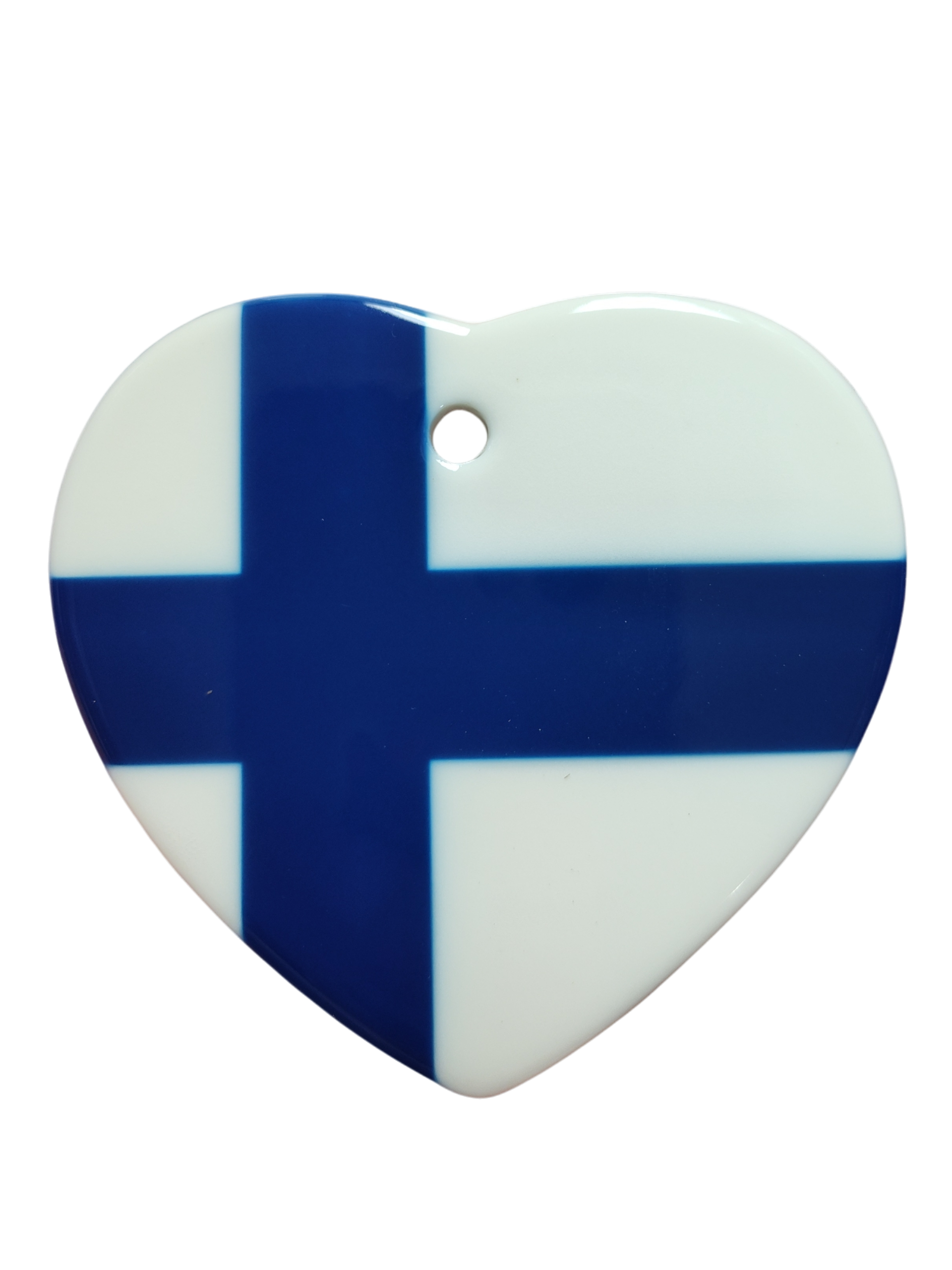 The Ornament: Finnish Flag Ceramic Heart Shaped Ornament features the blue Nordic cross of Finland on a heart-shaped ceramic design, celebrating Finnish heritage, and includes a small hole at the top for easy hanging.