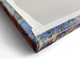 Close-up view of the back corner of the "Irises" by Vincent Van Gogh (1853-1890) print on canvas, showing folded fabric and staples securing it to the wooden frame.