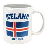 The 11 oz Established Series Iceland Flag Mug by Swedish Gift Store showcases the Icelandic flag with “ICELAND” in bold blue above and “EST 930” below—a stylish Scandinavian mug for Nordic fans.