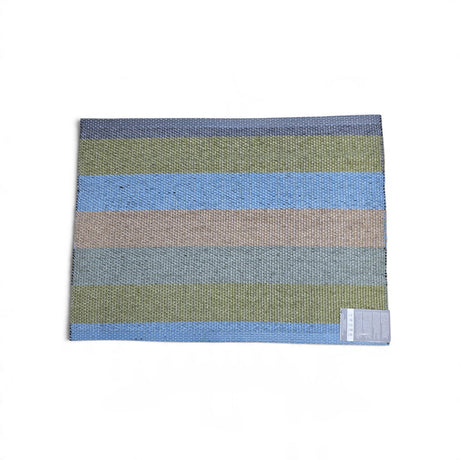 Rectangular woven vinyl placemat with horizontal stripes in shades of blue, olive green, and tan.