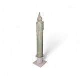 A white, 7" hand-dipped beeswax tapered LED candle with a timer sits in a simple square holder against a plain white background.