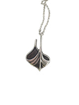 A Viking Ship pendant, crafted from pewter and sterling silver, hangs from a 24" chain (2" × 1.25"), highlighting detailed Norse artistry against a white background.