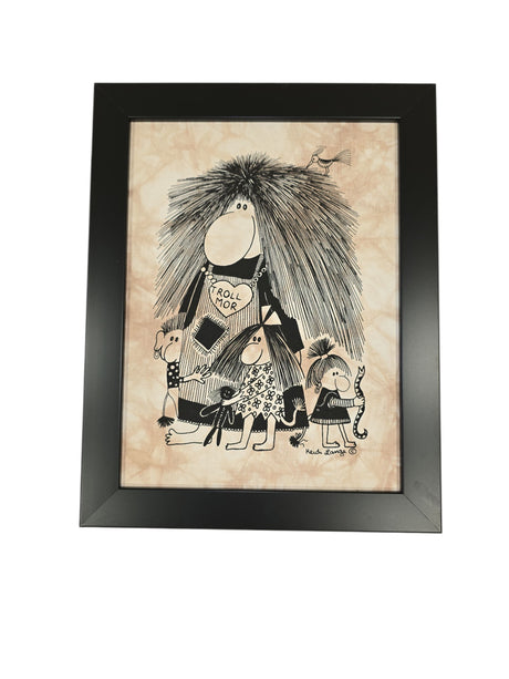 Framed batik artwork titled "Troll Mor (Norwegian Troll Mom)," featuring four cartoon trolls—including one with a "Trol Mor" sign—on beige, in an 11x14 black frame, inspired by Heidi Lange and classic Troll Mor art.