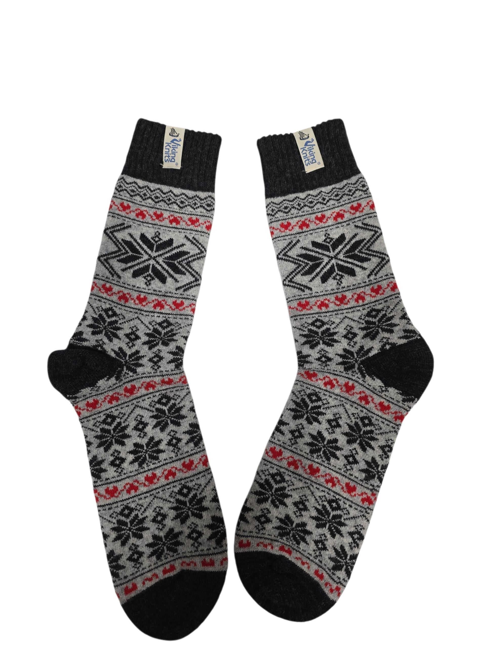 A pair of Viking Knits "Bergen" Nordic Design 60% Wool Socks featuring a black, gray, and red Norwegian Selbu Star pattern, displayed side by side on a white background.