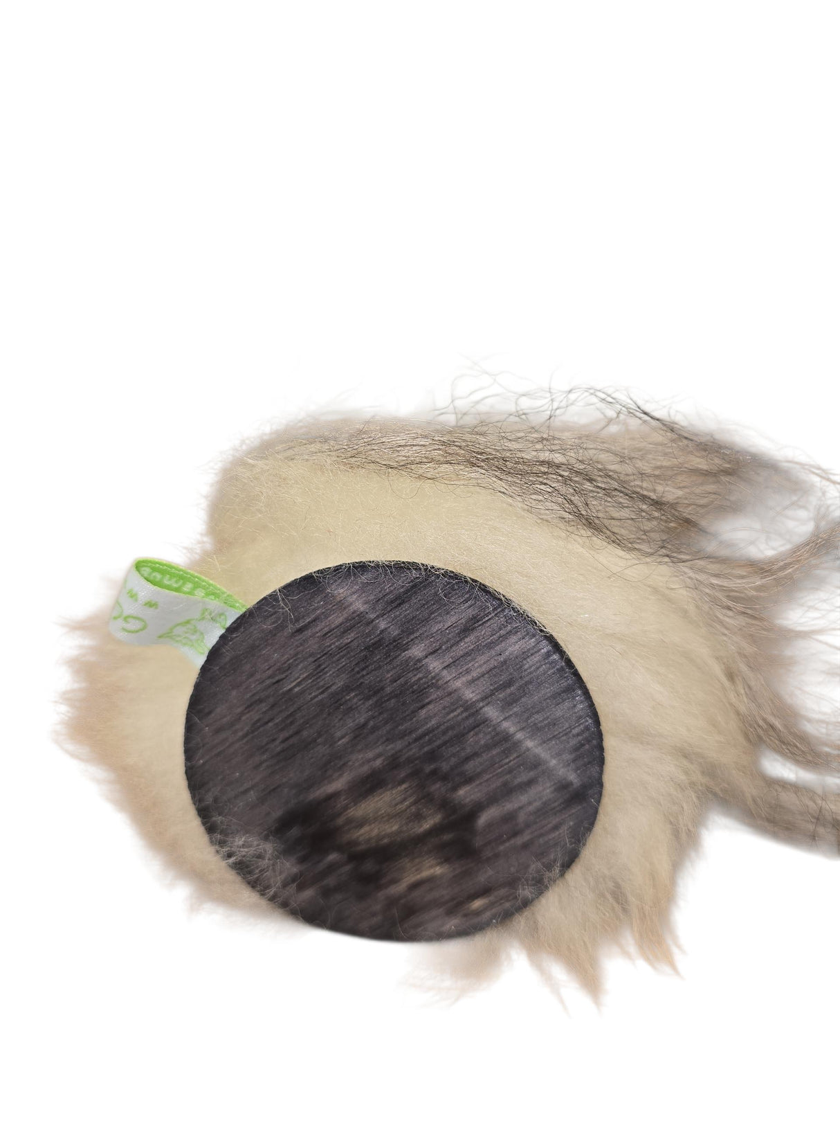 A round, furry gnome with a dark wood base and green tag, set against white—a handcrafted “Patch Tomte” by Gumselids of Sweden (7" to tip of hat) that’s perfect for sheep wool decor or as a Swedish Tomte-inspired accent.