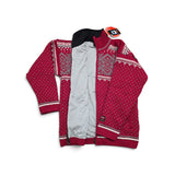 Red knit windstopper jacket with white Nordic geometric patterns and a grey lining.