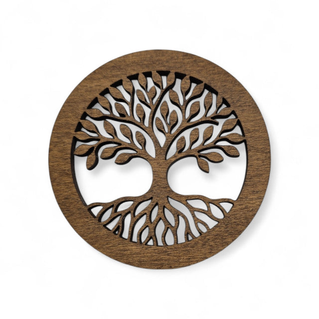 A 4" round wooden coaster with a laser-cut Tree of Life design and cork back, blending elegance and Scandinavian-inspired craftsmanship.