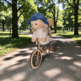 Figurine: Tomte Girl on Bike with Backpack 4.5" Tall with Hanging String Handcrafted in Scandinavia