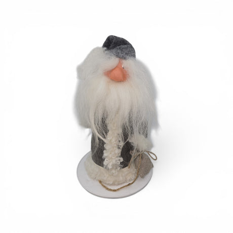 A 12" tall "Tomte with Robe" gnome figurine by Gumselids of Sweden for Talla Imports, featuring a long white beard and dressed in a gray hat and coat, stands on a wooden base holding a burlap bag against a plain white background, evoking the charm of Scandinavian folklore decor reminiscent of Swedish tomte traditions.