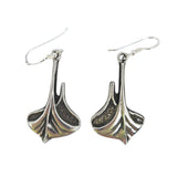 Norwegian-crafted Viking Ship pendant necklace in pewter and sterling silver, comes with a 24" chain; pendant measures 2" × 1.25", featuring smooth curved lines and a polished finish.