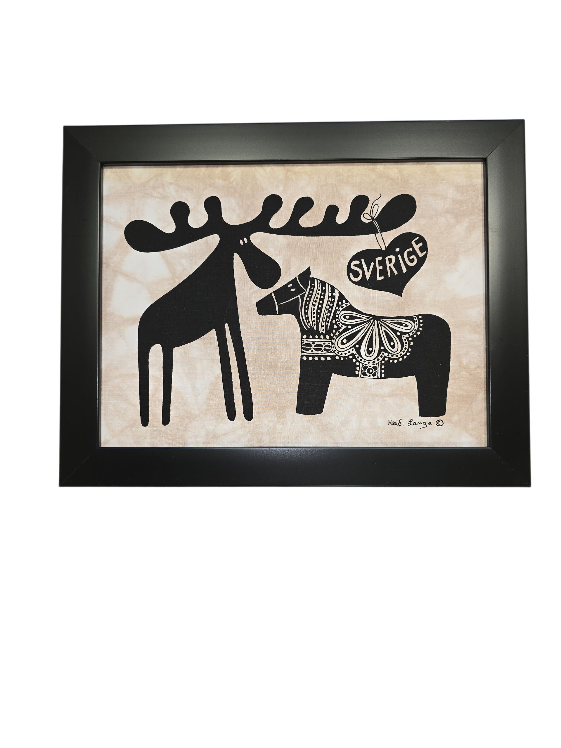 The Dala Horse with Moose "Sverige" Framed Batik Artwork (11x14, black frame) features a stylized black moose and Dala Horse beneath a heart-shaped "Sverige" sign.
