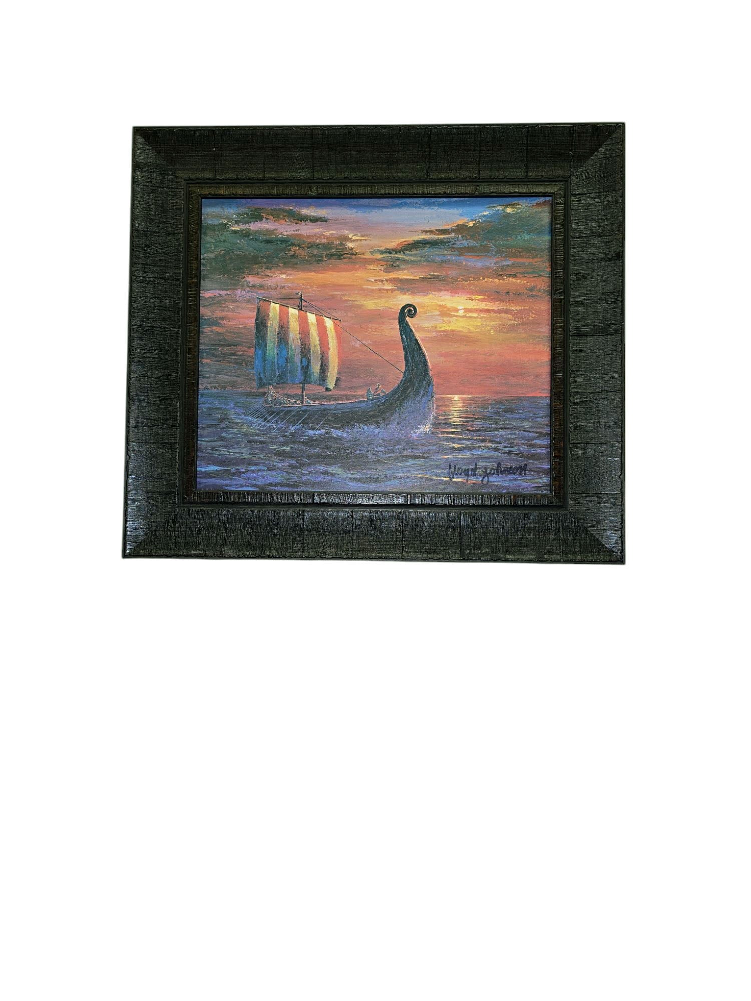 The Scandinavian artwork Final Light At Sea by Floyd Johnson features a Viking ship with a colorful striped sail gliding across the sea at sunset, displayed in an acrylic with dark brown frame.