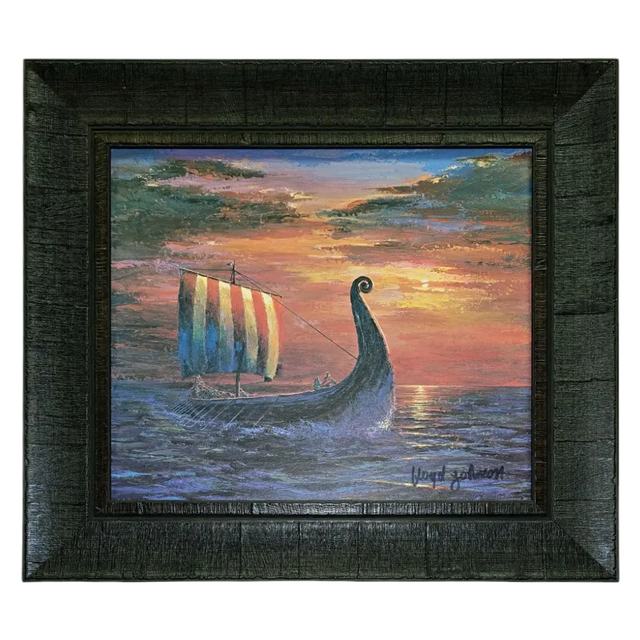 Final Light At Sea by Floyd Johnson (Faire - Scandinavian Specialties): Framed acrylic artwork of a Viking ship with striped sail at sunset, dramatic clouds, and vibrant colors reflected on the ocean in a dark brown frame.
