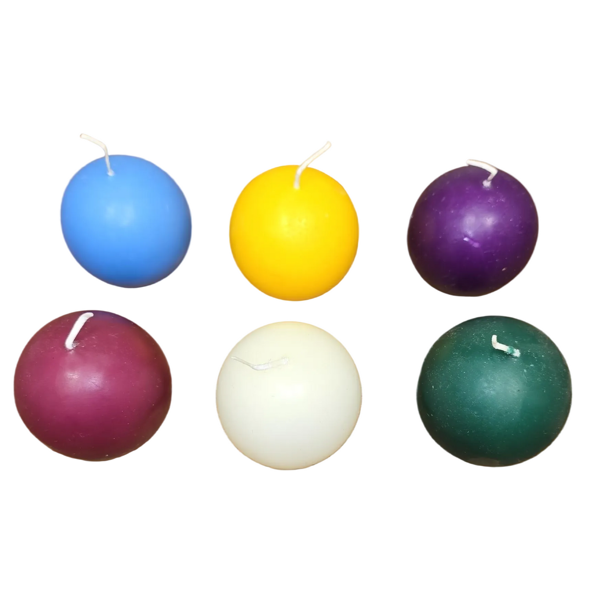 A 4-pack of Logum Kloster Lys 2.5" ball candles in assorted colors is arranged on a white background—ideal for bringing Scandinavian décor charm to any room.