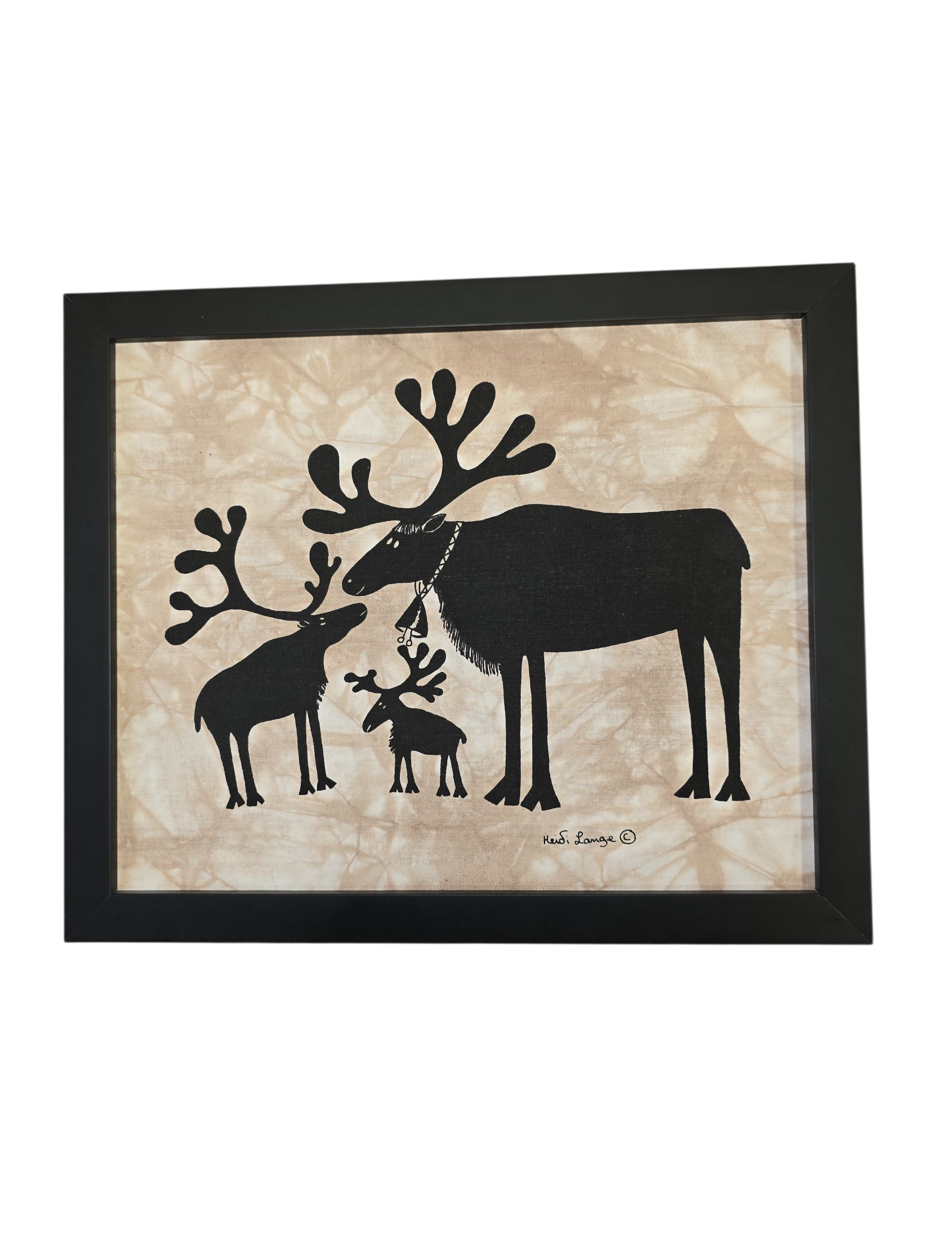 Artwork: Mother Moose with Her Two Calves Framed Batik Artwork (11x14 black frame) features three black silhouetted moose on a beige textured background, inspired by Heidi Lange art.