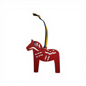 A red laser-cut Dala Horse ornament with kurbits, featuring a blue and yellow ribbon, handcrafted in Sweden and photographed against a plain white background.