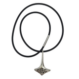 A black rubber chain necklace featuring a pewter Thor’s Hammer pendant with intricate detailing, inspired by Norse mythology jewelry—Necklace: Thor’s Hammer Pewter Pendant with Black Rubber Chain from Hillestad of Norway.