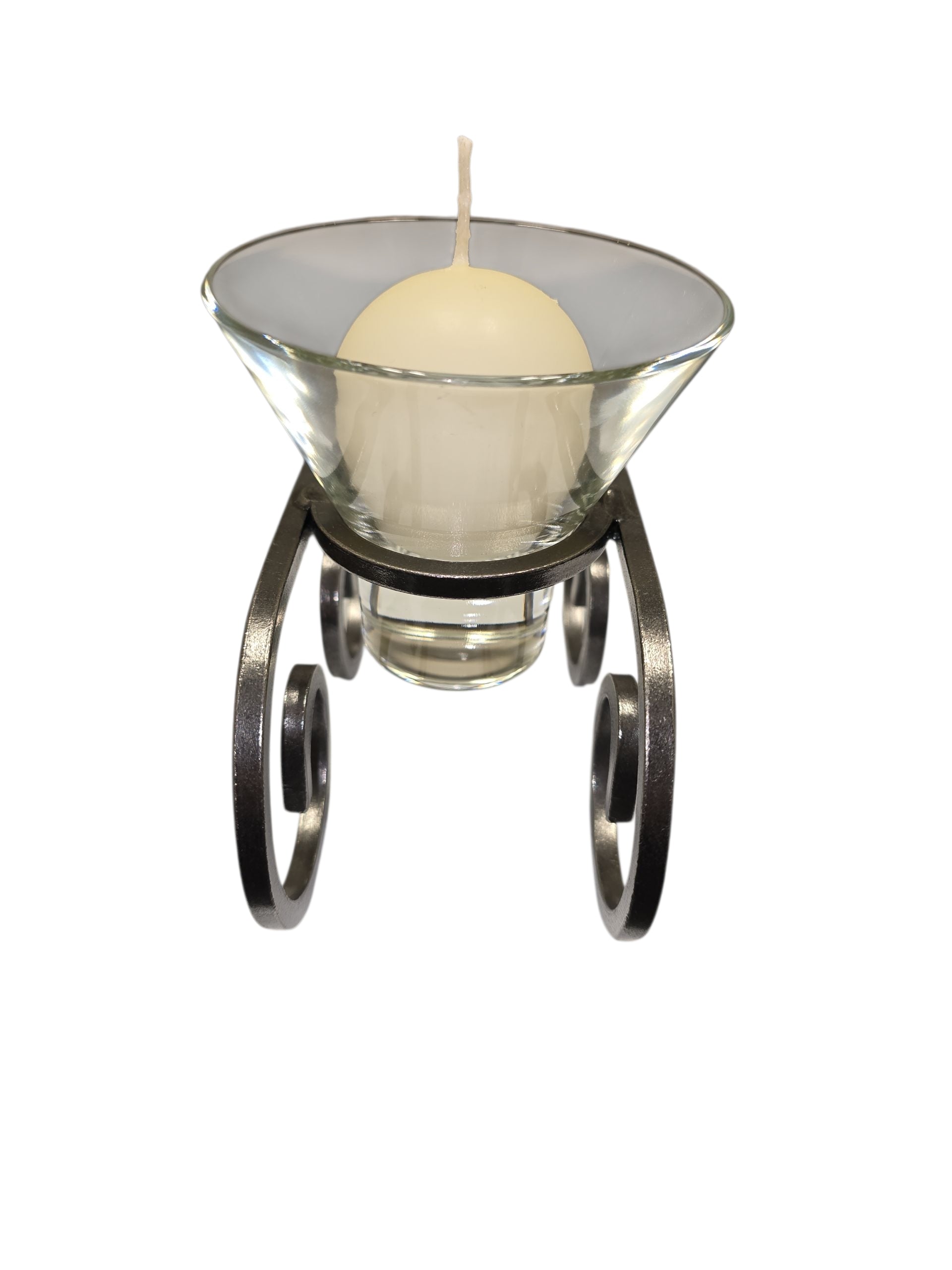 A white candle in the Leif Glass Cup Ball Candle Holder rests on a hand-forged Danish iron base with decorative curled legs, made in Denmark.