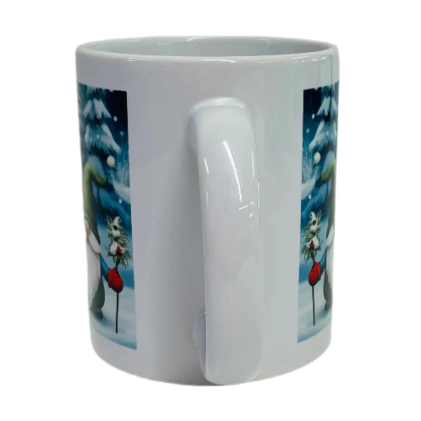 White ceramic coffee mug featuring three gnomes in a winter-themed design; the handle is centered in the image.