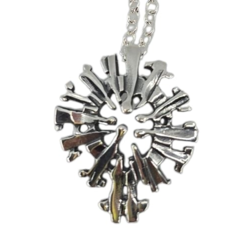The Midnight Sun Pewter Pendant by Hillestad of Norway features stylized human figures in a circle and hangs gracefully from a sterling silver chain, showcasing classic Scandinavian design.