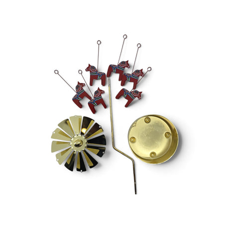 Swedish Dala horse candle carousel parts, including a gold-tone metal spinner, base, support rod, and five red Dala horse ornaments.