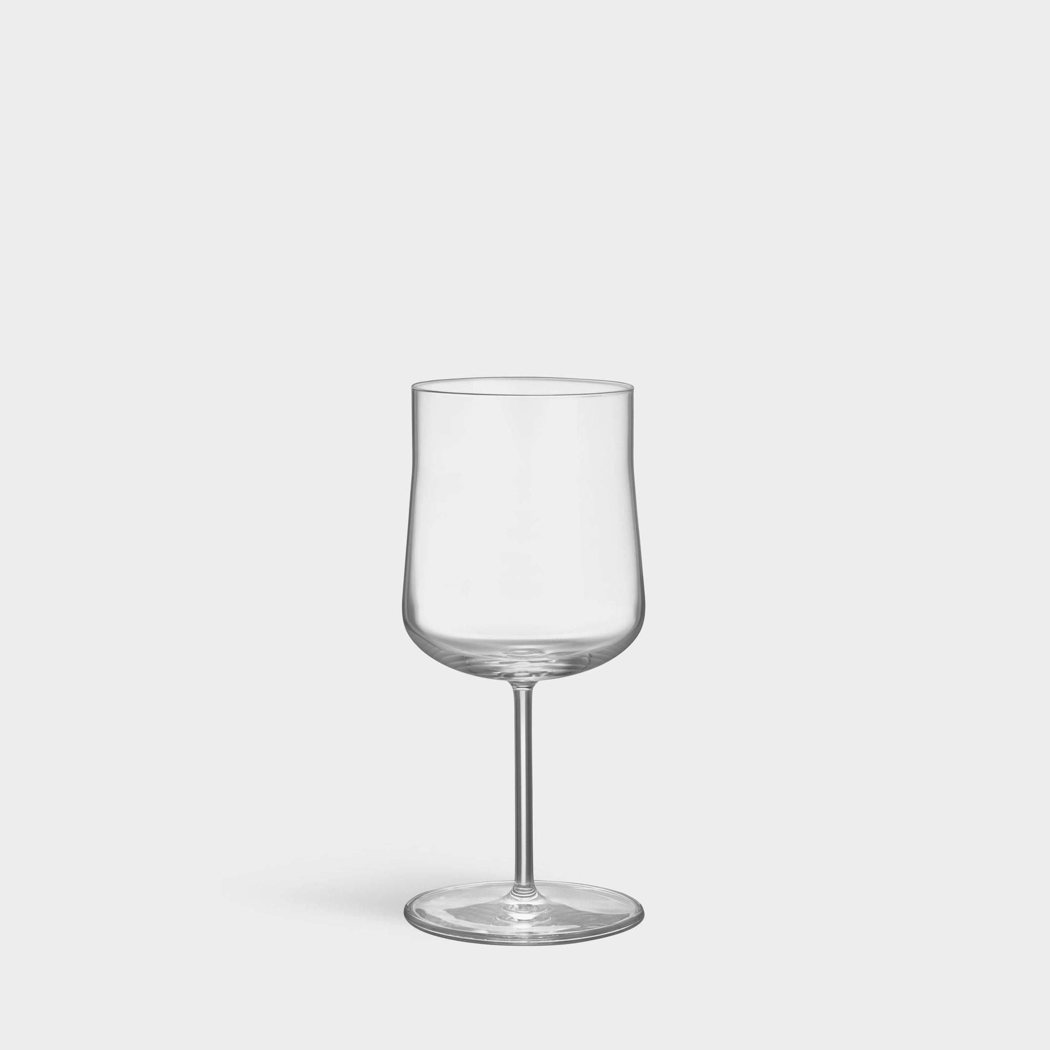 The Orrefors: Informal Medium Glass 12oz (2-Pack) features a smooth surface, embodying Scandinavian elegance. Its refined form on a white background echoes Orrefors artistry.