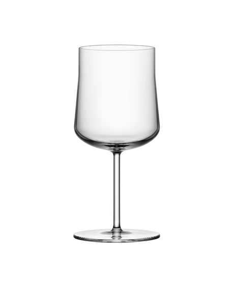 The Orrefors: Informal Medium Glass 12oz (2-Pack) features an empty, clear wine glass with a tall stem and flat base, showcasing elegant Scandinavian design against a white background.
