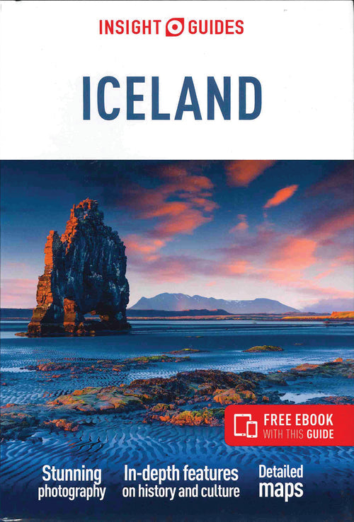 Cover of the book "Insight Guides Iceland," showcasing a coastal rock formation at sunset. The guide provides photography advice, historical and cultural insights, detailed maps, and tips on experiencing the Northern Lights.