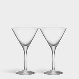 Two Orrefors: More Martini Glasses (6.4oz, 2-Pack) stand elegantly on a plain white background, their crystal clarity catching the light.