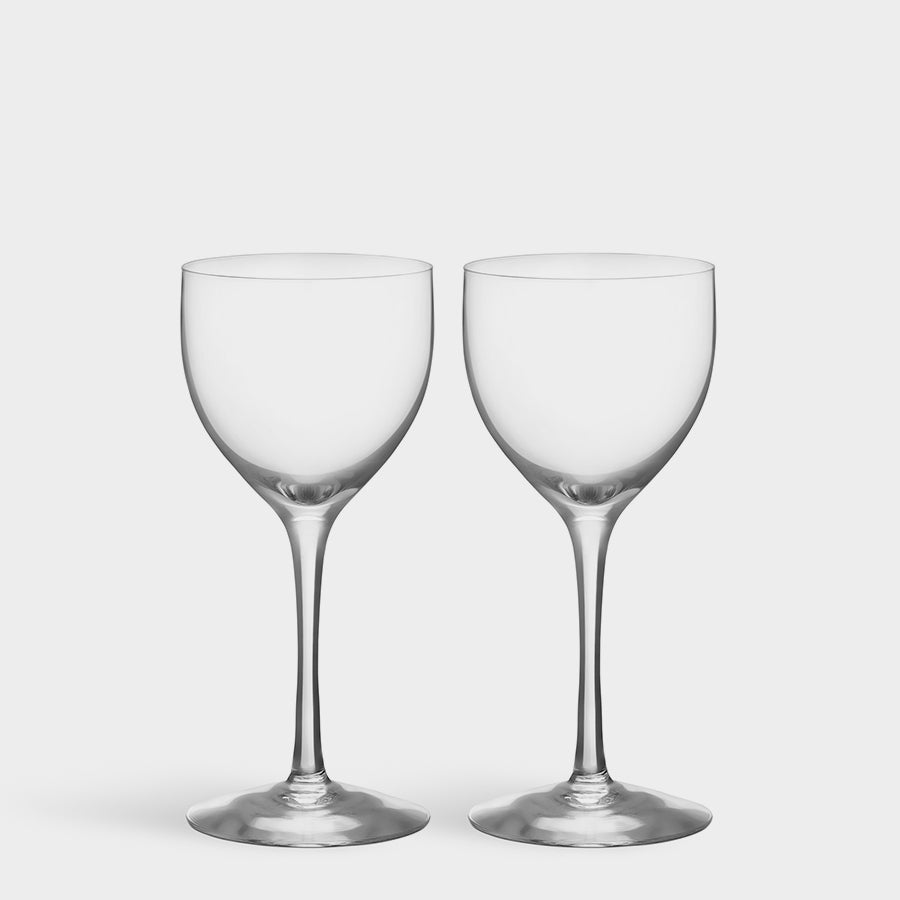 Two pristine Orrefors: More Nick & Nora Glass 5.7oz from the 2-Pack set stand elegantly against a plain white background.