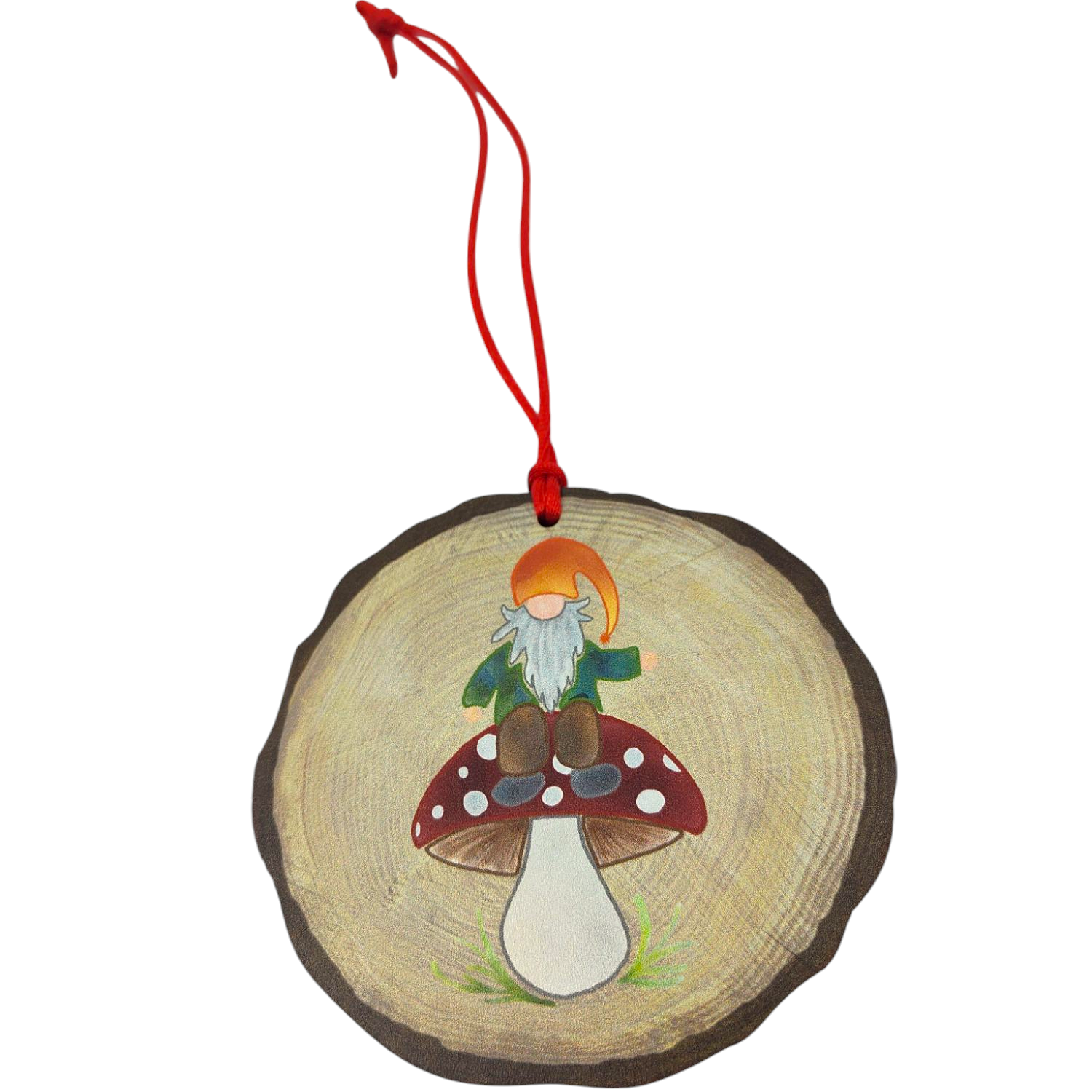 The Ornament: Nisse on Mushroom from the Nordic Collection features a delightful Nisse perched on a red and white mushroom, equipped with a red string for easy hanging.